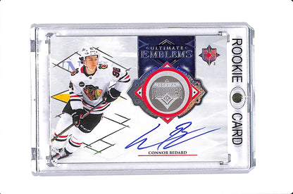 2023-24 UPPER DECK ULTIMATE CONNOR BEDARD ULTIMATE EMBLEMS ROOKIE AUTO #UE-CB