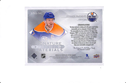 2023-24 UPPER DECK ULTIMATE CONNOR MCDAVID SIGNATURE PREMIUM MATERIALS /25 #UMS-MC