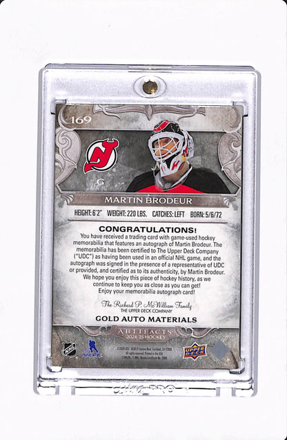 2024-25 UD ARTIFACTS MARTIN BRODEUR GOLD AUTO MATERIALS /25
