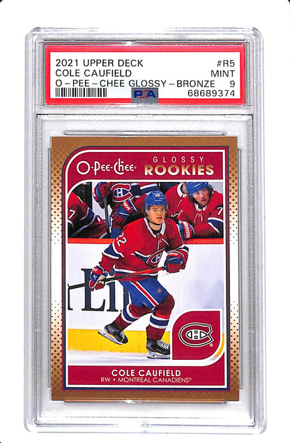 2021-2022 UPPER DECK O-PEE-CHEE #R5 COLE CAUFIELD GLOSSY BRONZE ROOKIES PSA 9