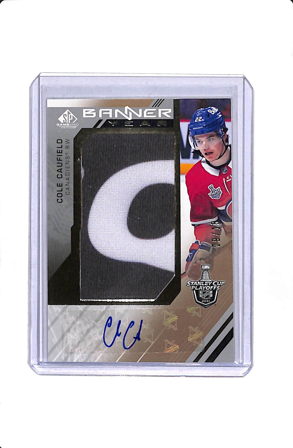 2021-22 UD SP GAME USED STANLEY CUP PLAYOFF BANNER YEAR COLE CAUFIELD ROOKIE AUTO /15